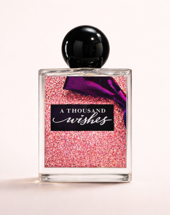 A Thousand Wishes Perfume is a beautifully balanced fragrance that combines fruity freshness with soft florals and warm amber tones. The opening sparkles with sweet pink prosecco and juicy quince, followed by a heart of peony and jasmine for a romantic floral touch. The base settles into warm amber, sandalwood, and musk, creating a long-lasting and comforting finish. &nbsp; This perfume is perfect for everyday use as well as special occasions. Its elegant glass bottle and glossy black cap give it a premium look, making it an excellent choice for gifting. Designed for long wear, this fragrance keeps you feeling fresh and confident throughout the day.